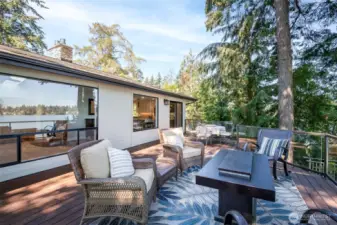 Rear of house on deck level, large view windows, from inside takes in the views of the lake