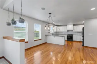looking in towards dining room and kitchen from living room