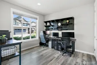 upon entry to the left is this office/flex bedroom