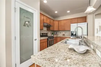 Frosted glass door large pantry and granite countertops
