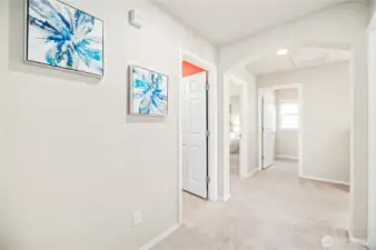 Wide hallways, white painted millwork throughout and plenty of natural light