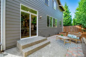 Larger agregate patio with additional pavers for your patio furniture, BBQ and entertaining or relaxing.