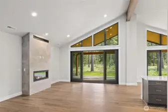 Soaring ceilings and hardwood floors throughout the kitchen and great room.