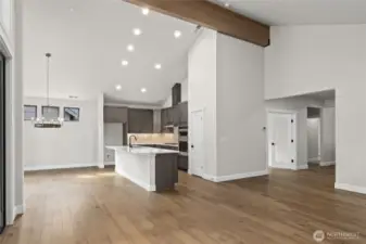 Gourmet kitchen with gas cooktop, stainless steel appliances and micro/oven wall unit.