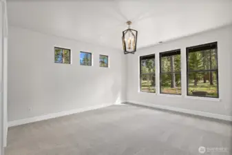 Primary bedroom with beautiful chandelier