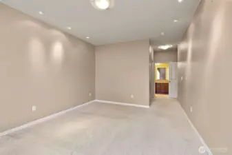 Primary bedroom with walk-in closet and 3/4 bathroom