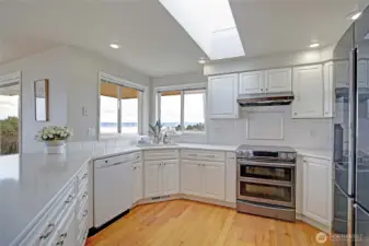 Updated kitchen with Stainless steel double oven and fridge