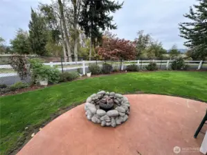 Extended patio with gas fire-pit for outdoor enjoyment.