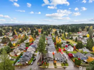 Corner lot next to tucked away private street, perfect for playing outside and riding bkes.