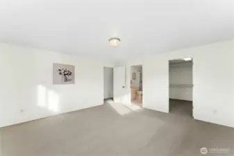 Primary bedroom features walk-in closet and en-suite bathroom.
