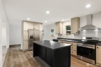 Stunning open concept kitchen with all new appliances.