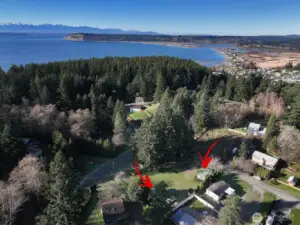 Two homes on a +/- .62 acre lot in Sunlight Shores. Each house has its own driveway and there is quite a bit of space between the two homes. *An appointment is required to tour, please do not walk on the property without an agent present.*