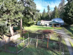 Fenced garden for planting some veggies and your favorite blooms.