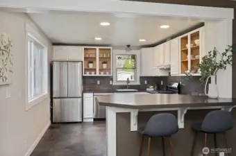 Stainless appliances and plenty of storage in the kitchen. The windows in the Main House are newer.