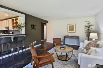 Let's go check out the rest of the house. Through the hallway and to the left/straight is the washer & dryer and side entrance of the house (covered deck) and to the right is the full bath, bedroom & guest room.