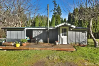 A generous deck with a small covered area expands your living space. Updated with interior paint & LVP flooring during seller's ownership. Guest House may be toured only on a second tour of the property.