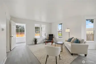 Another look at living room and sun room covered porch.
