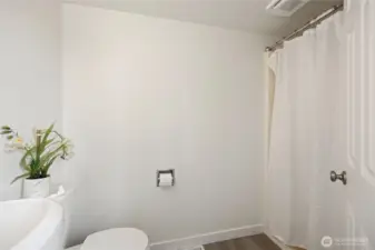 3/4 Primary bath with sink, toilet and shower.