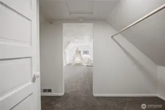 Walk through the large closet area upstairs into the massive upstairs bedroom / bonus room.