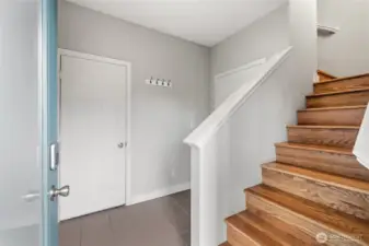 Entrance providing direct access to the garage and upstairs.