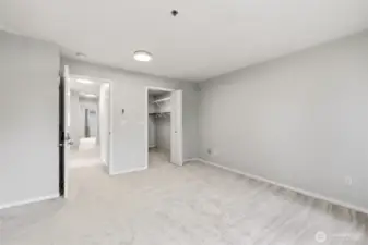 Master suite with a walk-in closet.