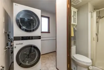 Laundry room and 3/4 bath on the lower level. Stacking washer/dryer stay!