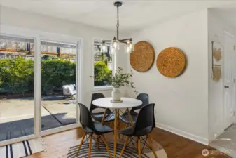 Kitchen eating space with sliders to the huge entertainment patio in the back yard