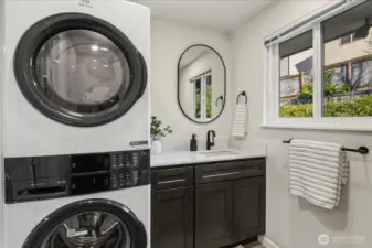 Newly remodeled 3/4 bathroom with stackable washer and dryer