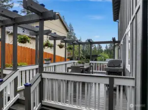 Back deck with pergola that's perfect for entertaining.  Bring your lights as the icing on the cake.