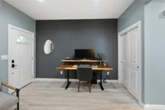 Main entry living area that can be used as a office/flex space.