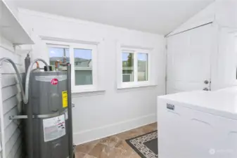 Spacious utility room right off the kitchen