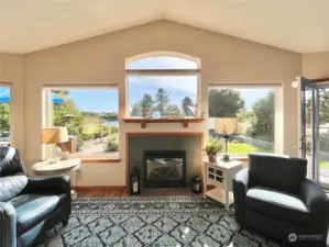 Propane Fireplace and Upgraded Window Coverings in Living Room