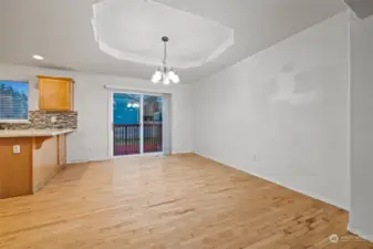 Dining area. Slider leads to deck off back of home.