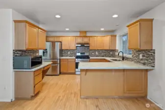 Kitchen with plenty of counter space and eating bar.