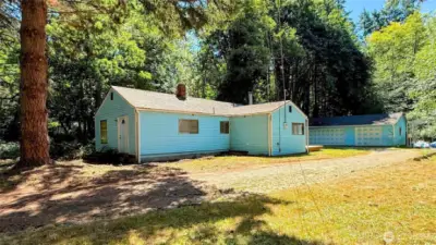 Tucked away on a quiet lot surrounded by trees