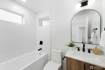 Lower level full bathroom! Model home, colors and finishes may vary.
