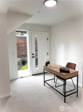 Lower level bed/office with access to your back patio. Model home, colors and finishes may vary.
