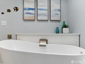 Large bathing tub in this updated primary bathroom. Layback and relax!