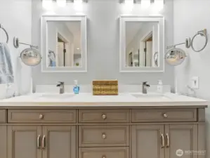 Primary bathroom updated with heated wood plank porclian tile flooring.