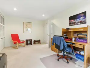 Currently an office area.  The shutters to the leftr open to a closet area and could be utilize as another bedroom.