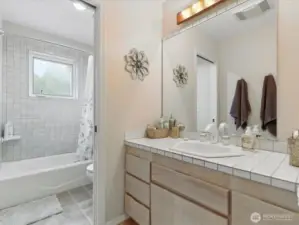 Bathroom with shower and tub for the upstairs bedrooms.