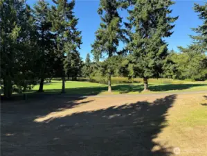 Backyard with large pond.  There is so much to enjoy from this home.