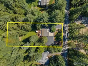 Large lot, shy acre. Plenty of privacy, but this property also gets a lot of sunshine! No worries, AC will keep you cool.