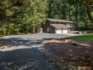 So much room for parking on this paved front area, never worry about having a party and you also have a two car garage. You could think about a large shop or additional garage over on this side of the property as well.