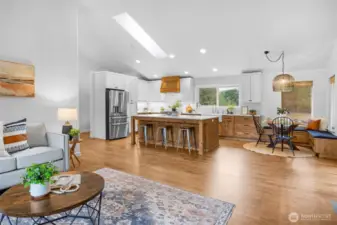 Vaulted ceilings with skylight and open living area
