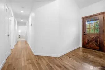Entryway down hall to beds/baths