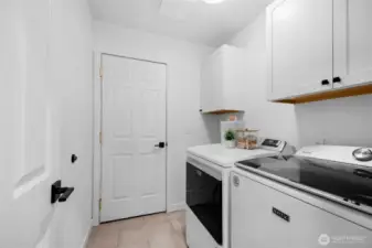 Updated laundry with heated flooring