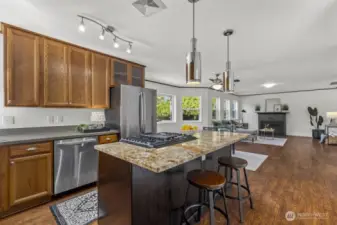 The updated kitchen is a chef’s delight with sleek finishes.