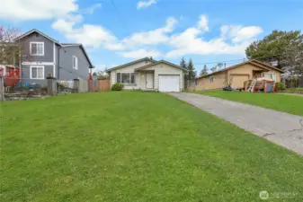 Home sits up and back from Sheridan Ave