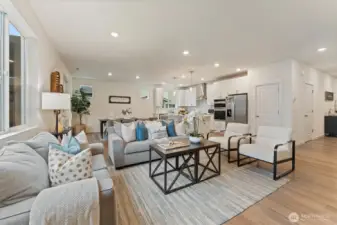 Spacious living area designed for comfort and entertaining, featuring neutral finishes and abundant natural light.